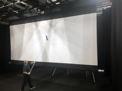 Large format projection screen cleaning